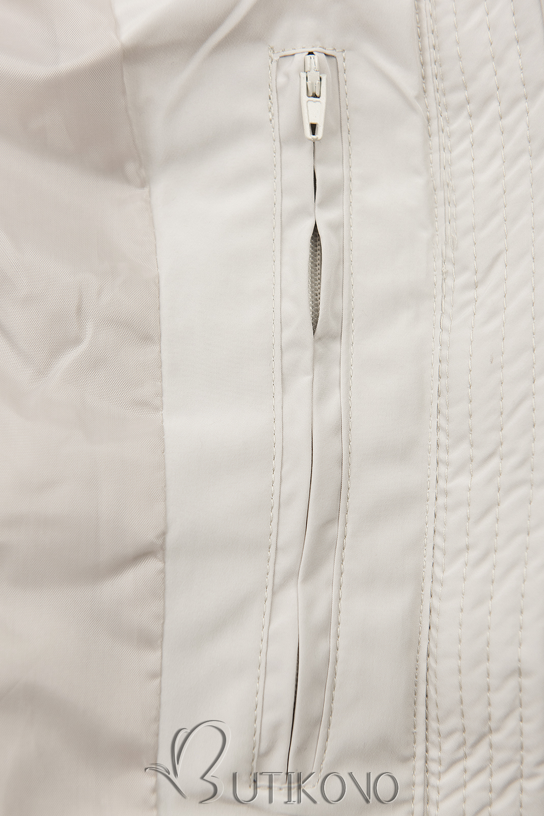 Krémově bílá zimní bunda v prodlouženém střihu