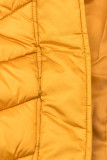 Zimní prošívaná bunda s páskem žlutá