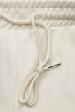 Ecru sportovní kalhoty s kapsami