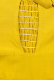 Žlutý kalhotový overal