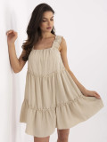Světle béžové rozšířené šaty s volánem
