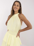 Světle žluté minišaty s volánem a vázáním