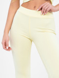 Žluté široké sportovní kalhoty s vysokým pasem