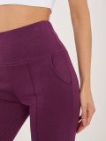 Tmavě fialové sportovní kalhoty s rovným střihem
